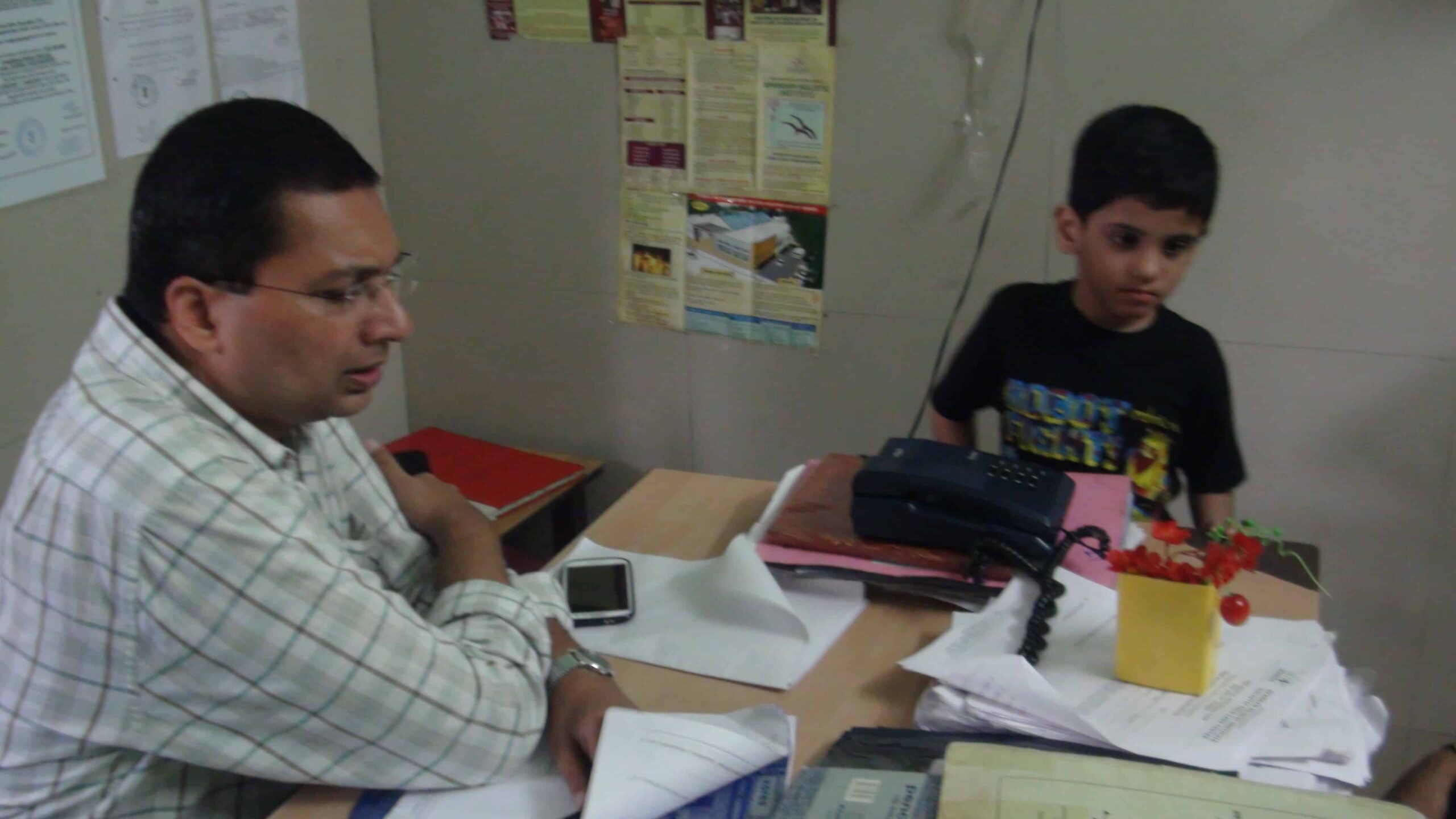 Malay Dave (Psychiatrist) discussing with parents